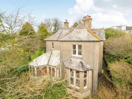 Detached period property set on over half an acre